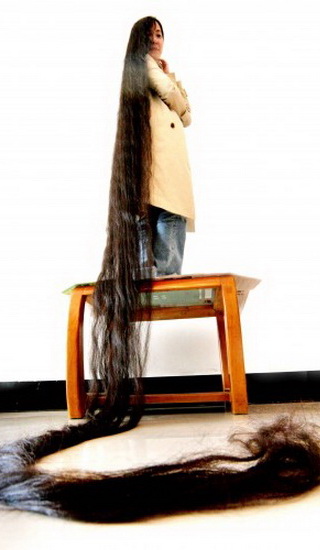 самые длинные волосы в мире